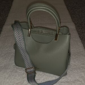 Green Satchel with Modern Design and Versatile Strap